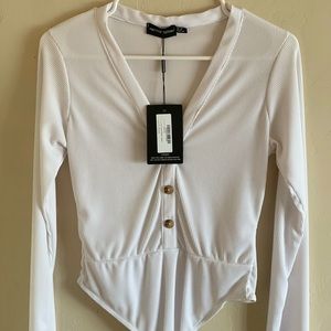 Pretty Little Thing long sleeved body suite never worn